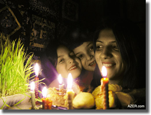 The Joy of Family at Novruz. Typical table as prepared in Baku with candles and pastry sweets and "samani" (sprouted wheat). Mehdi Mammadov