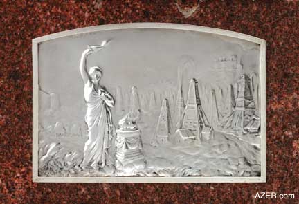Back of the Nobel Clock with silver impression of the Nobel oil fields in Baku.